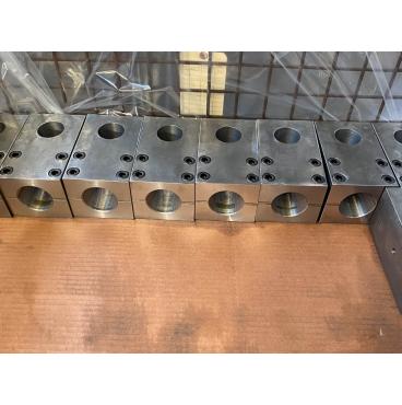 Machined steel block assemblies